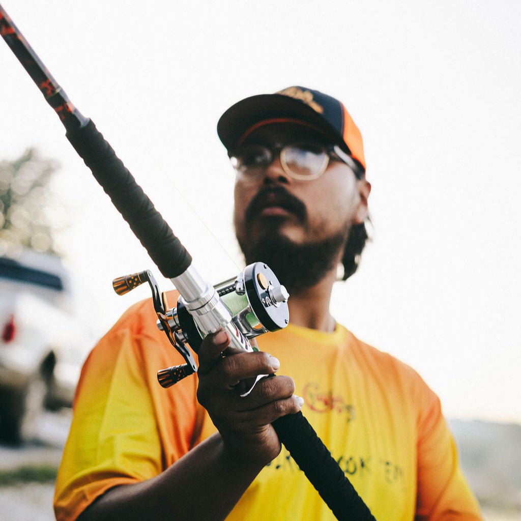 Catfish Pro Black Dragon Fire 7'6" Glow Casting Rod