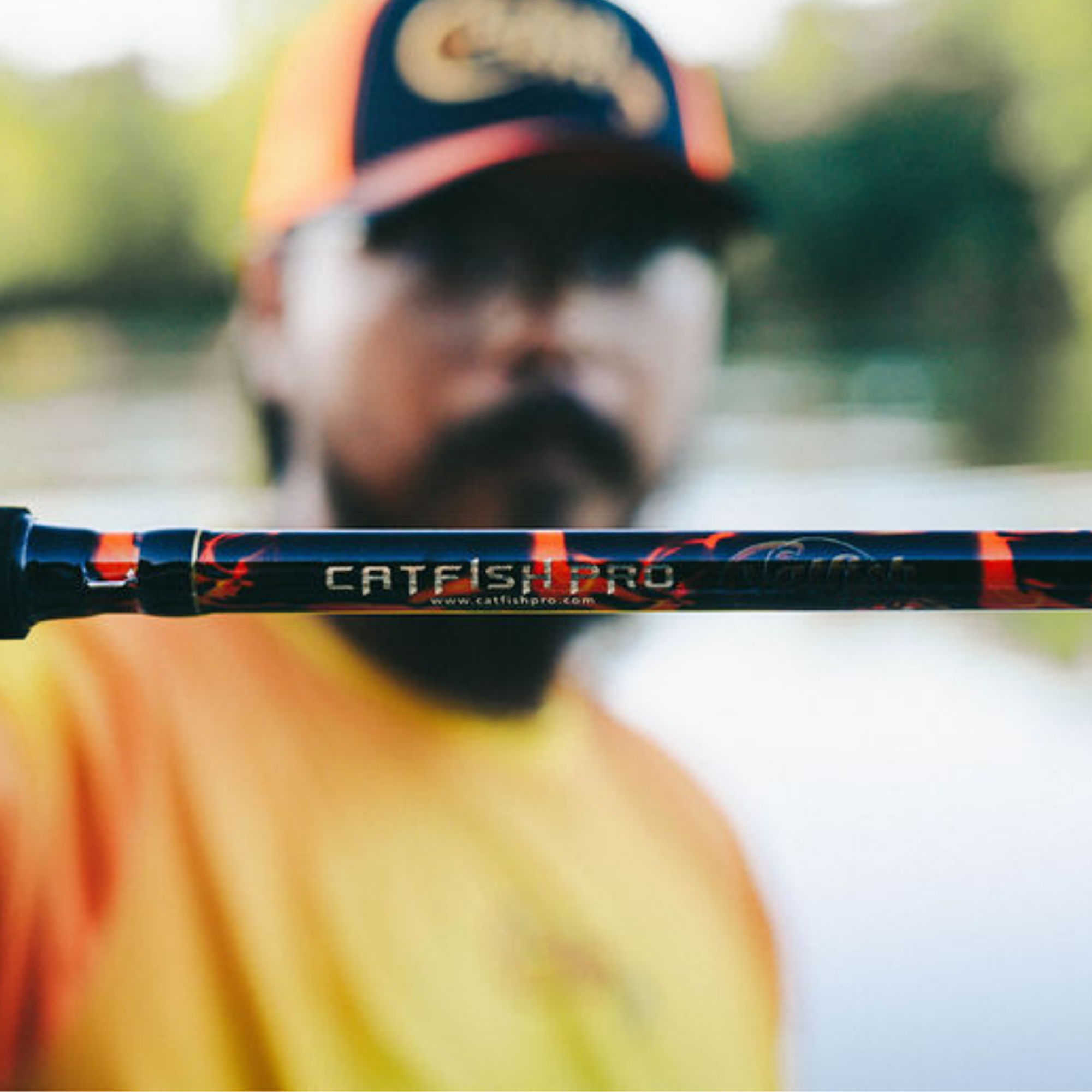 Catfish Pro Black Dragon Fire 7'6" Glow-in-the-Dark Spinning Rod