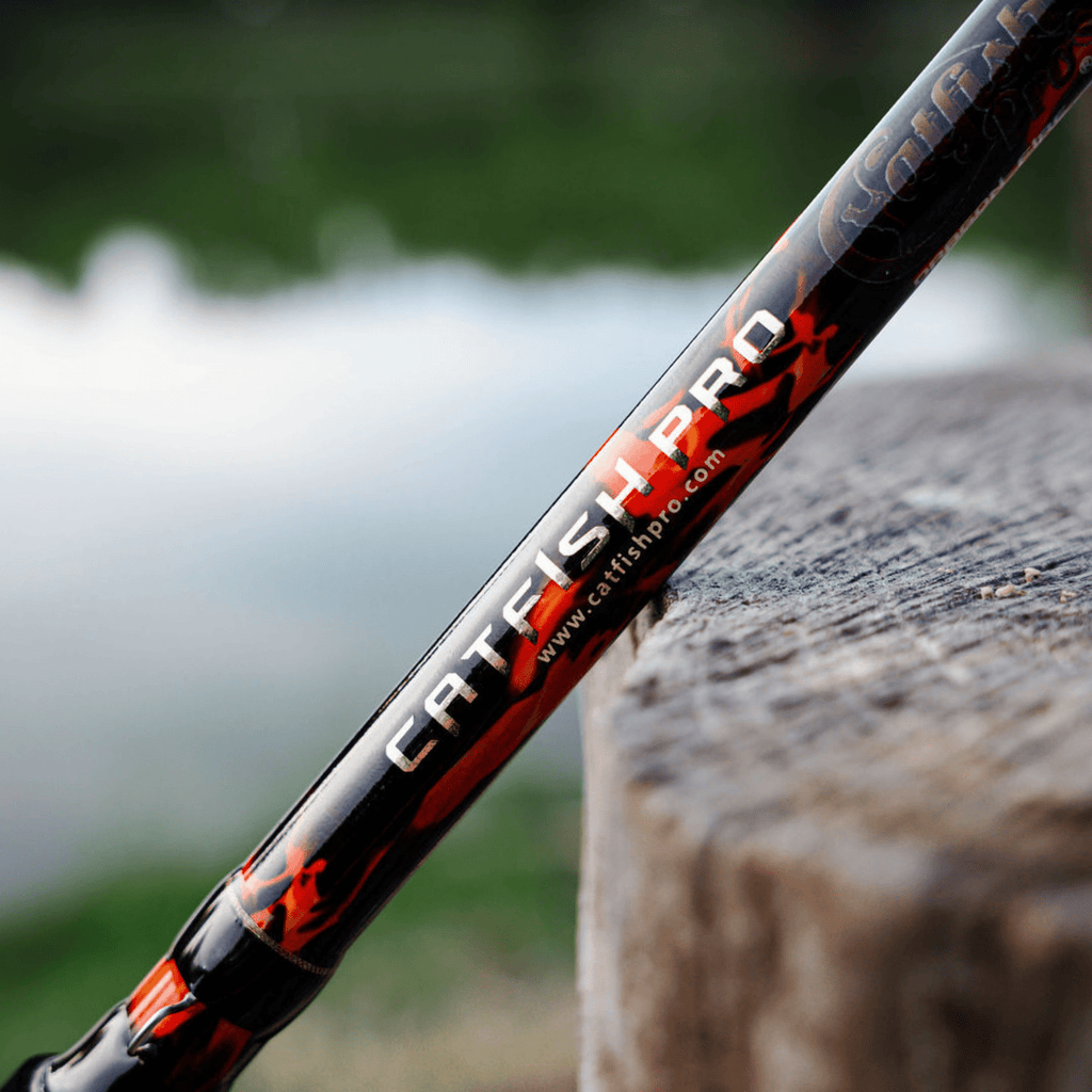 Catfish Pro Black Dragon Fire 7'6" Glow-in-the-Dark Spinning Rod