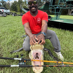 Catfish Pro Orange Dragon Fire 7'6" Glow-in-The-Dark Spinning Rod